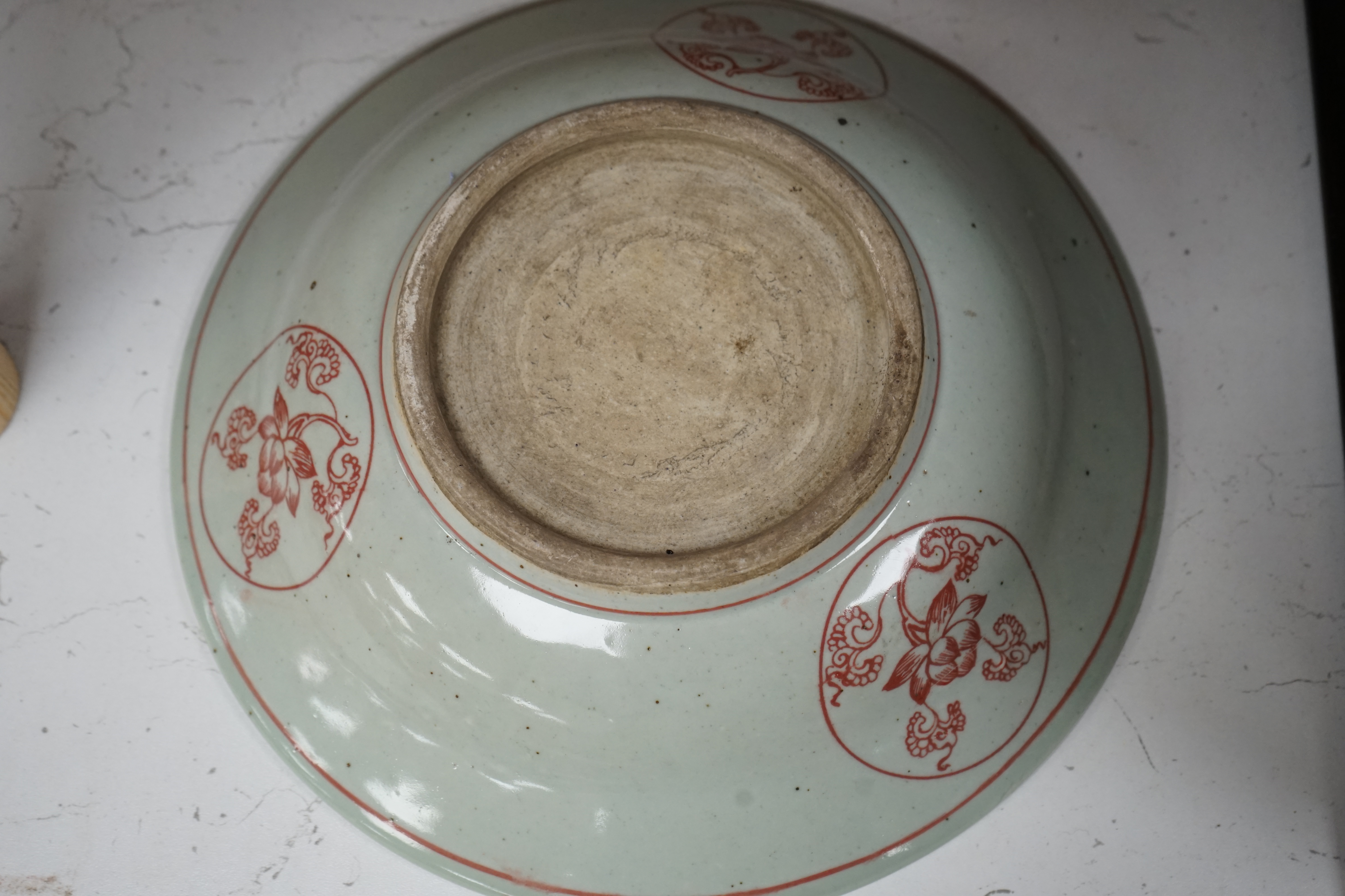 A Chinese underglaze copper red dish, 27cm diameter., Condition - good